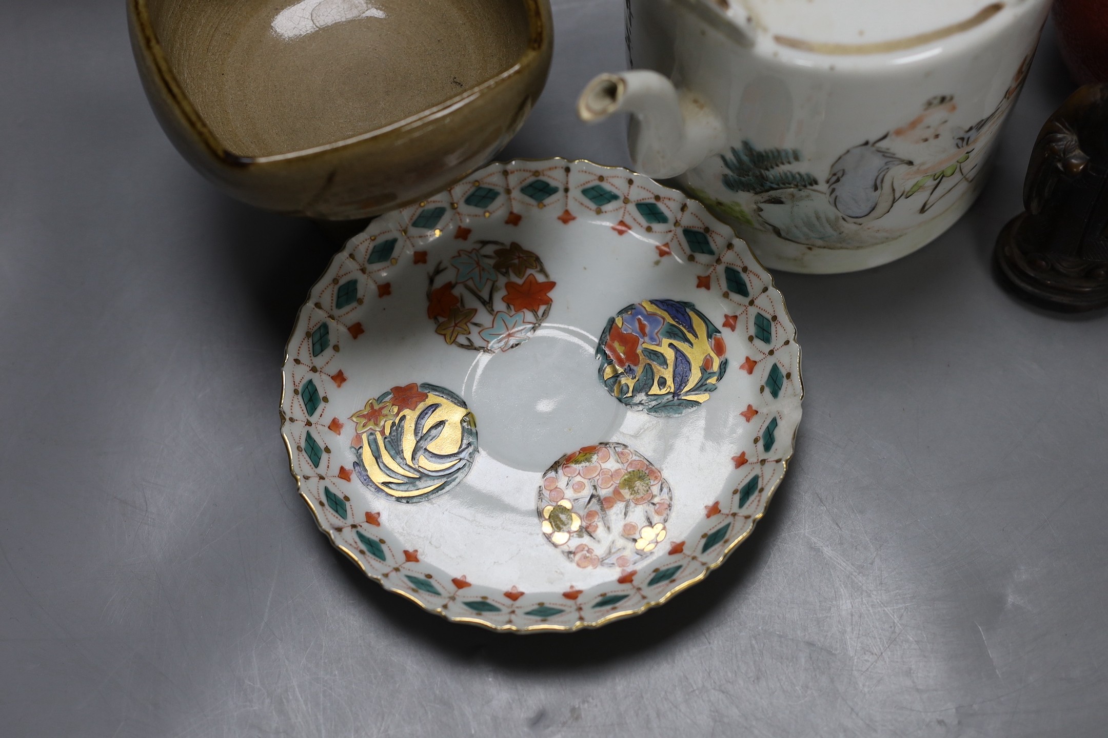 A Chinese Republic period teapot, a famille rose barrel and cover, a famille verte saucer, porcelain duck, pottery stem bowl and a resin model of Shou Lao